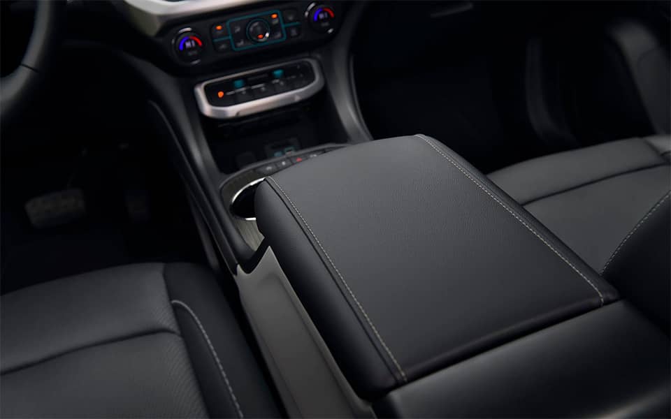 Acadia's front console and climate controls